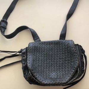 Cleobella black leather cross body bag.